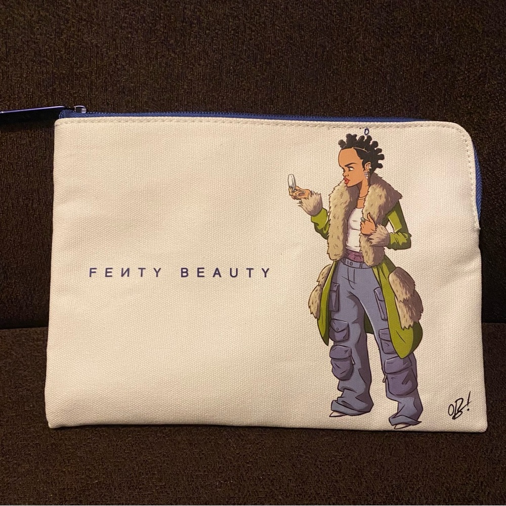 BRAND NEW FENTY BEAUTY cosmetic bag. 7”H x 9”W. Cream and blue colors.